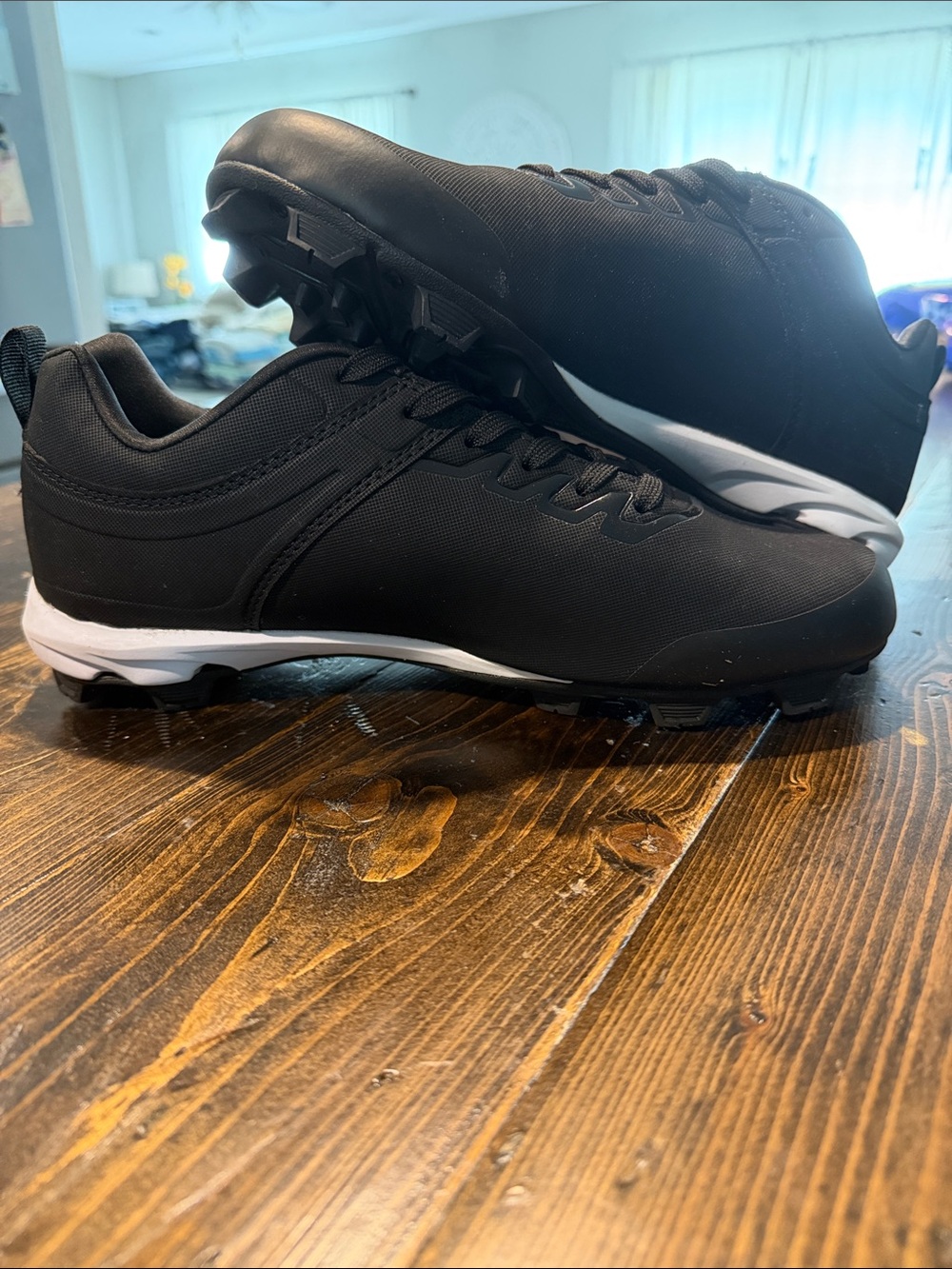 Rawlings Men's Black Athletic Cleats with White Accents